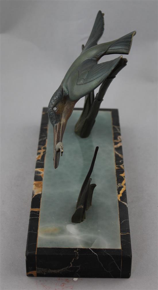 A French Art Deco patinated bronze model of a kingfisher, 11.75in.